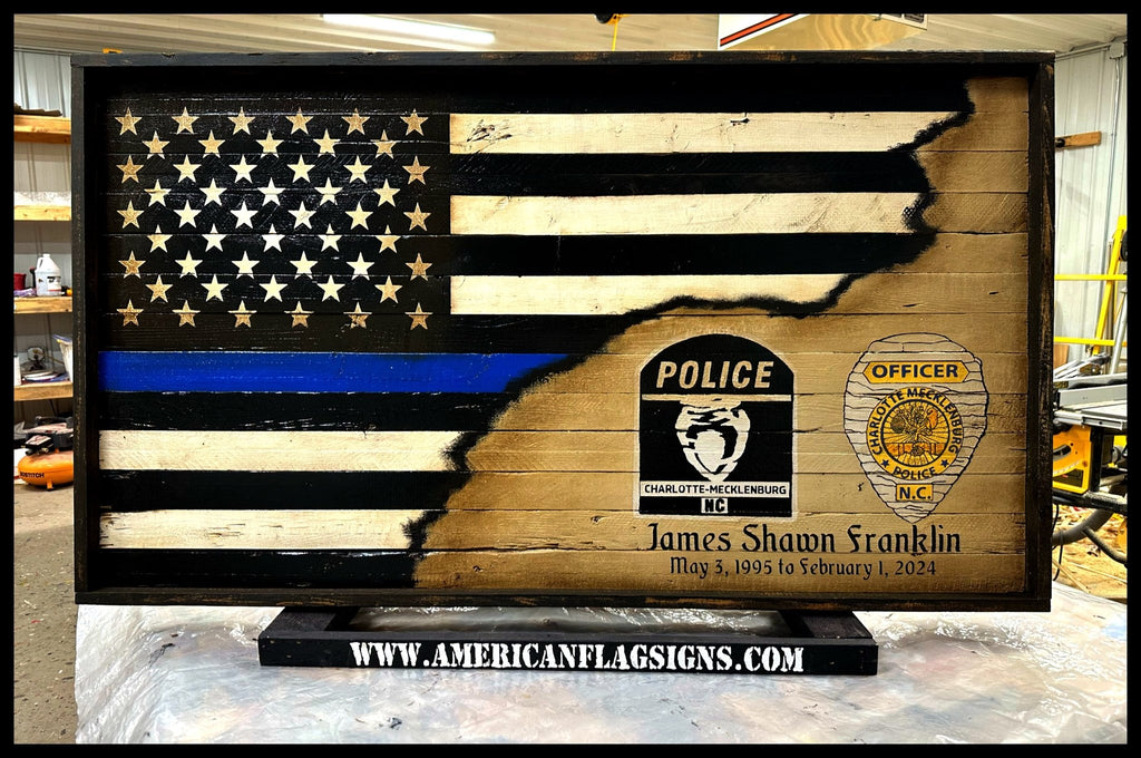 Charlotte-Mecklenberg PD Give Custom Blue Line Flag for Retirement