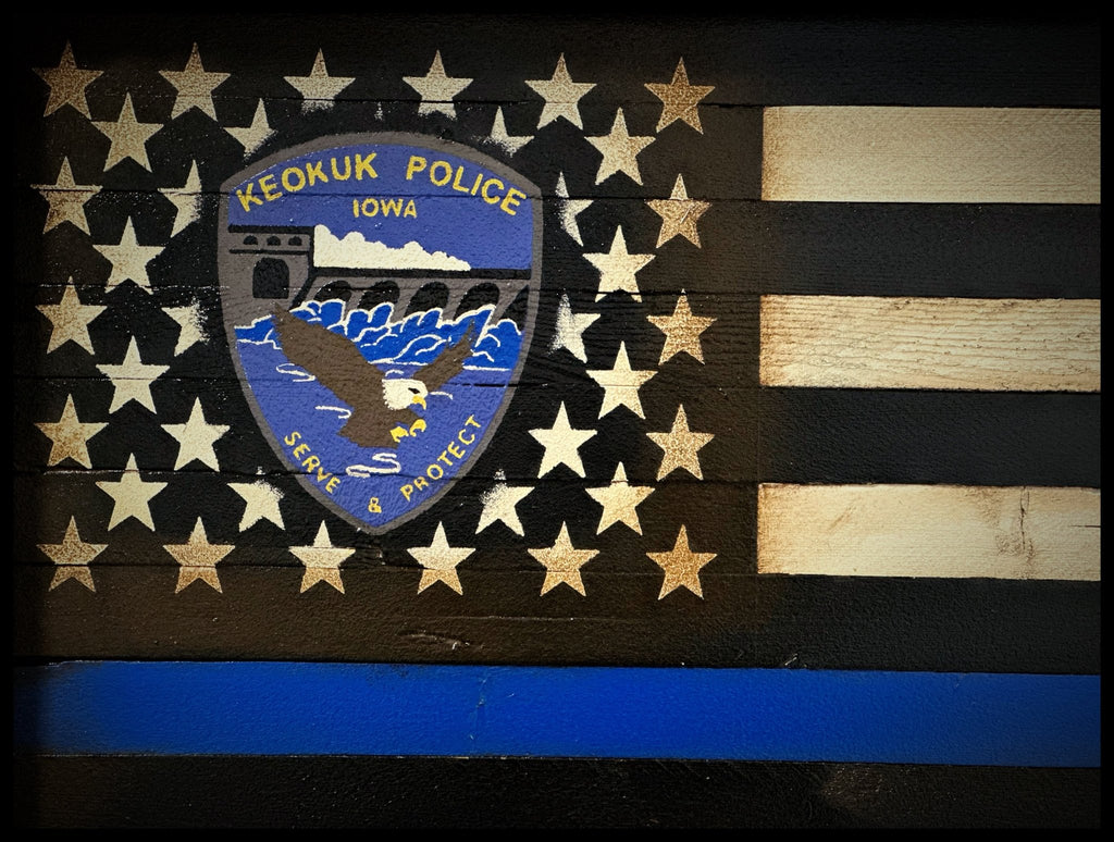 Keokuk Officer Receives Custom Blue Line Flag for Retirement